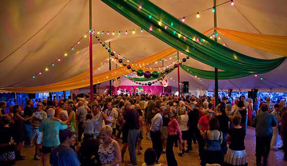The Rhythm & Roots Festival offers a festive dance tent and a constant party - Photo © Jake Jacobson, asharpereye.com The Rhythm & Roots Festival offers a festive dance tent and a constant party - Photo © Jake Jacobson, asharpereye.com