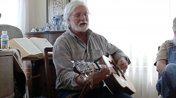 Bill Staines performs at a house concert in Franklin in 2010. Photo by Stephen Ide.
