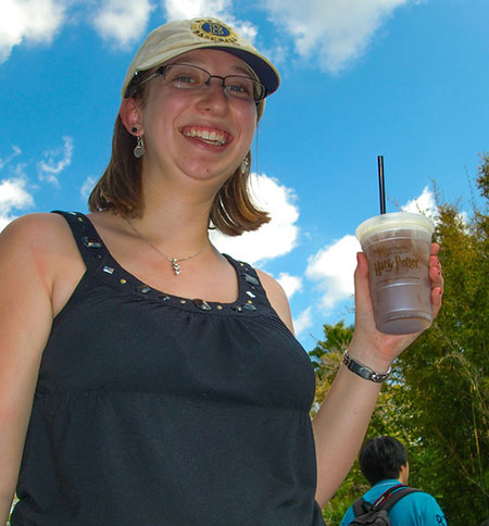 Rachel enjoys a butterbeer at the Wizarding World of Harry Potter
