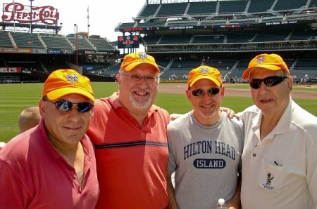 Dad with his three boys at a Mets game in 2010.