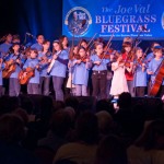 Children perform on stage at the Joe Val Bluegrass Festival as part of the Bluegrass Academy for Kids ~ Photo by Stephen Ide