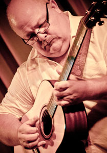 Jim Hurst performs at IBMA 2011 ~ Photo © Copyright 2011 Stephen Ide
